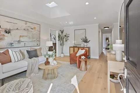 a view of a patio with a table and chairs