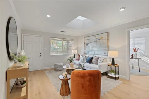 a view of a building with a tree