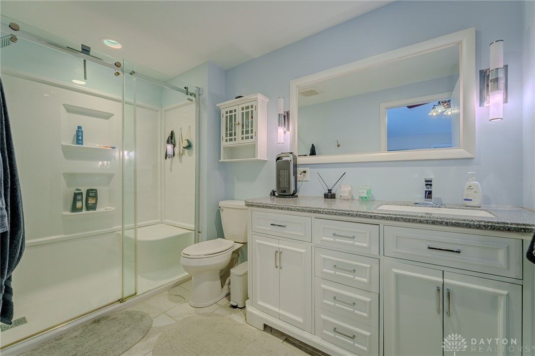 305 South Vandemark Road Sidney, OH 45365 - Photo 27 of 32 This bright bathroom features a spacious shower and a vanity with ample counter space.