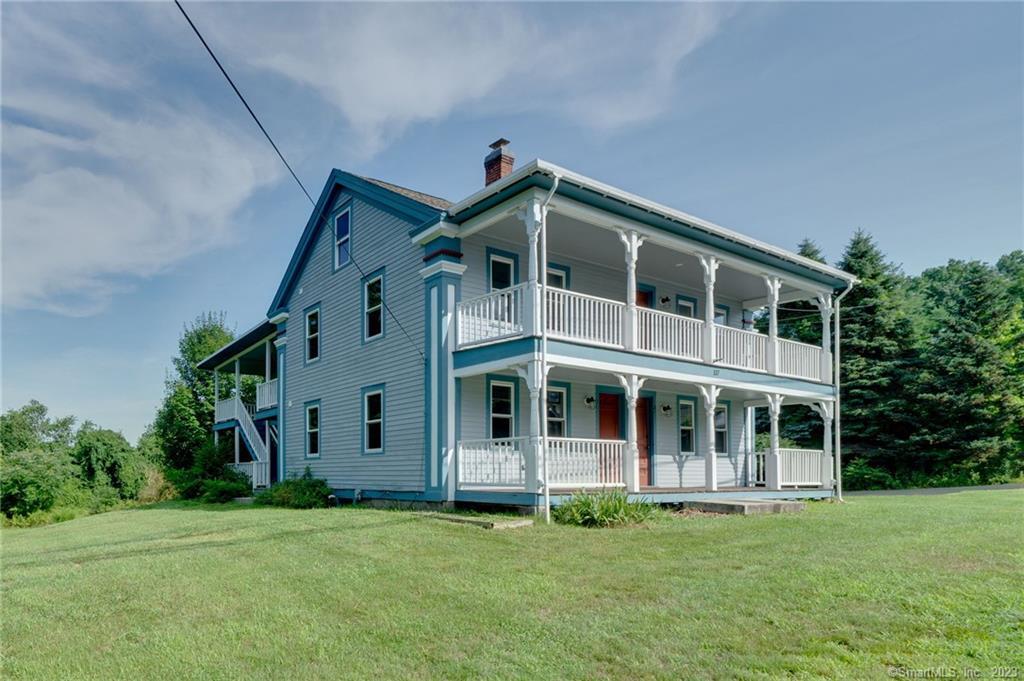 157 River Road Willington, CT 06279 - Photo 1 of 1 a big house with a big yard and large trees