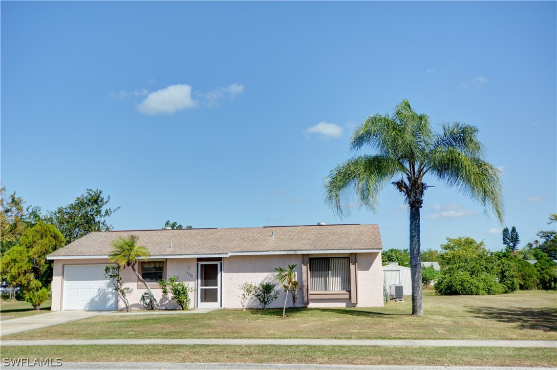 6790 Harmony Road North Port, FL 34287 - Photo 1 of 20 a view of a house with a swimming pool