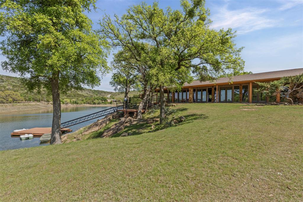 1060 Post Oak Road Gordon, TX 76453 - Photo 15 of 23 a view of a house with swimming pool and sitting area