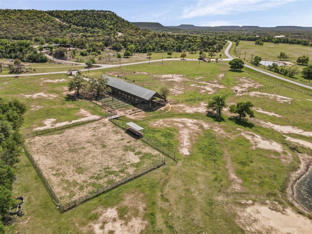 1060 Post Oak Road Gordon, TX 76453 - Photo 19 of 23 a view of a lake with a mountain