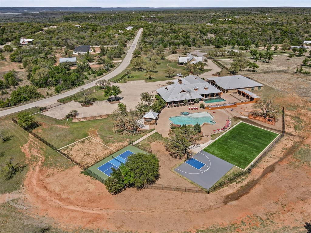 1060 Post Oak Road Gordon, TX 76453 - Photo 22 of 23 an aerial view of residential houses with outdoor space