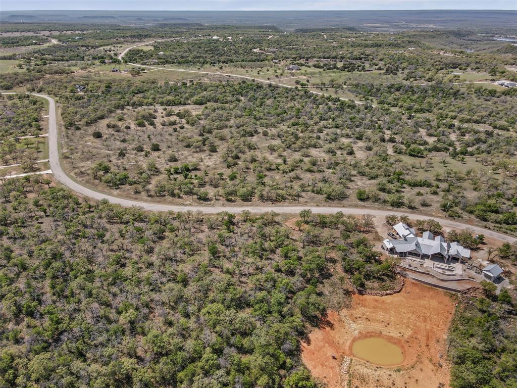 1060 Post Oak Road Gordon, TX 76453 - Photo 6 of 23 an aerial view of residential houses with outdoor space