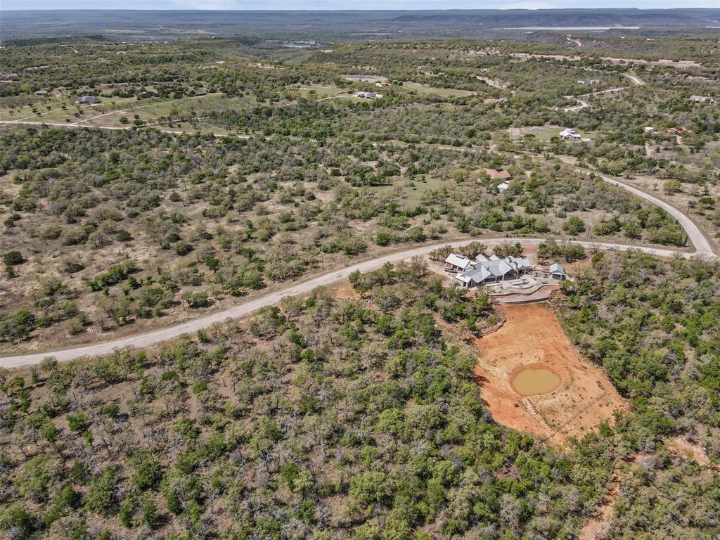 1060 Post Oak Road Gordon, TX 76453 - Photo 7 of 23 an aerial view of residential houses with outdoor space