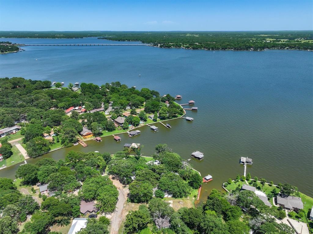 136 Wedgewood Loop Mabank, TX 75156 - Photo 3 of 12 a view of a lake with a city