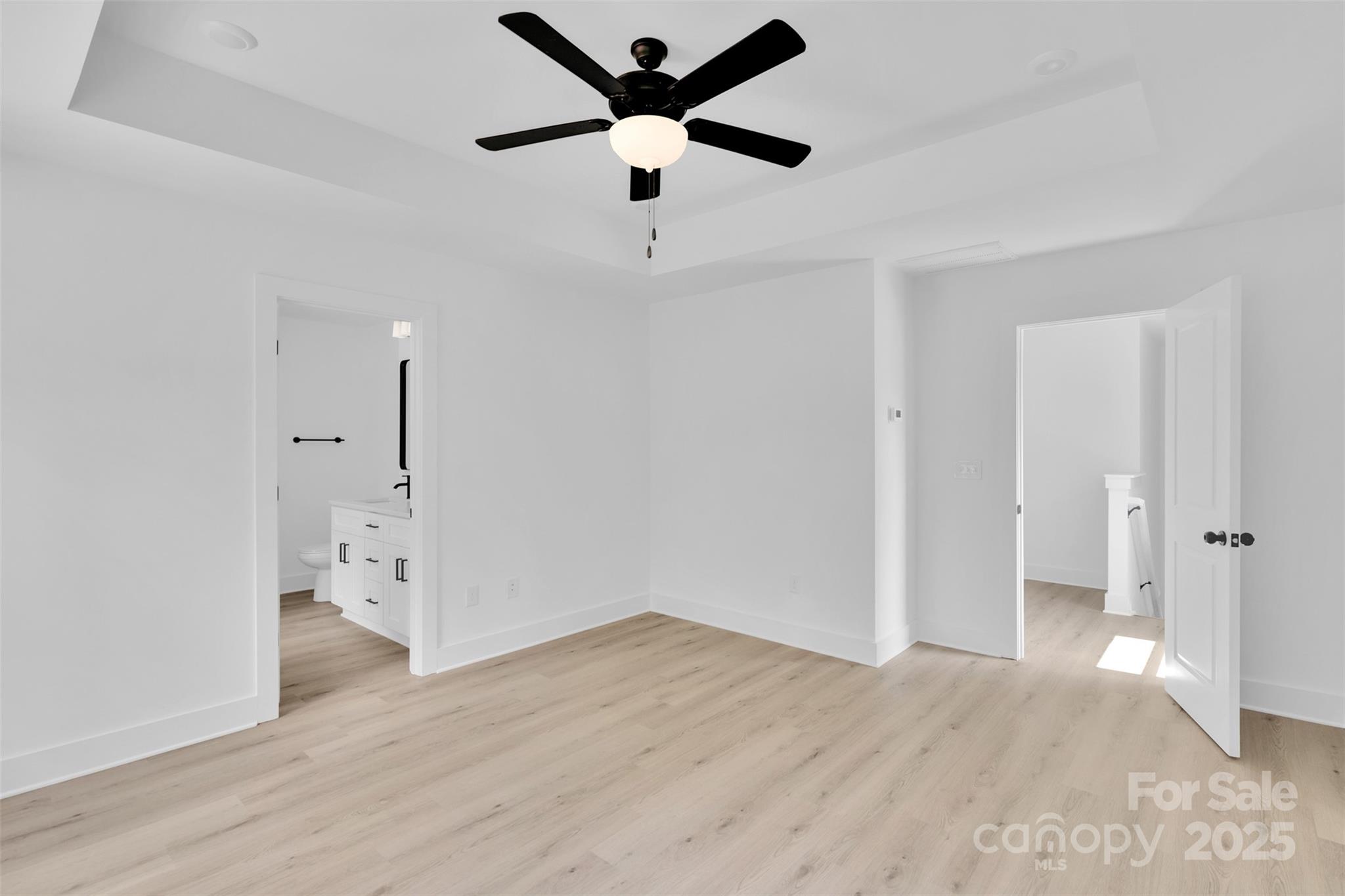 3549 Lake Road Charlotte, NC 28269 - Photo 16 of 34 a view of an empty room and window ceiling fan