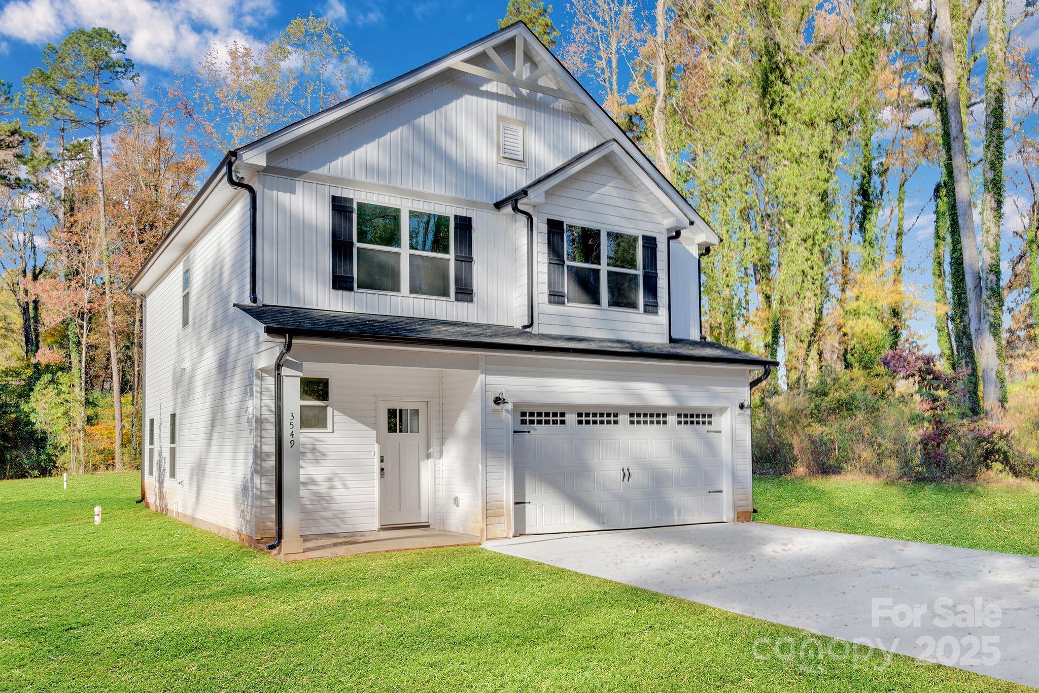 3549 Lake Road Charlotte, NC 28269 - Photo 28 of 34 a view of a house with a yard