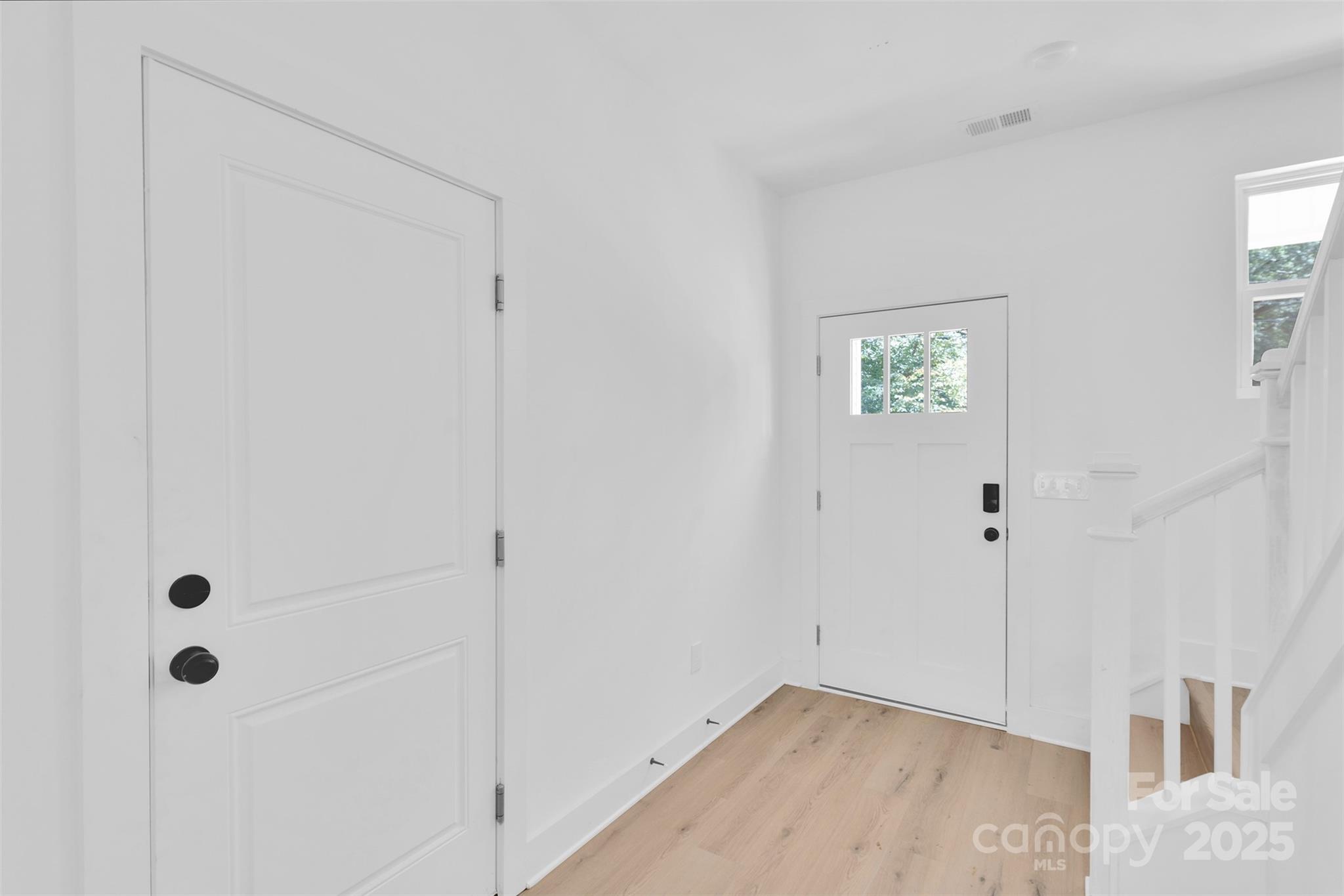 3549 Lake Road Charlotte, NC 28269 - Photo 7 of 34 a view of a hallway with closet