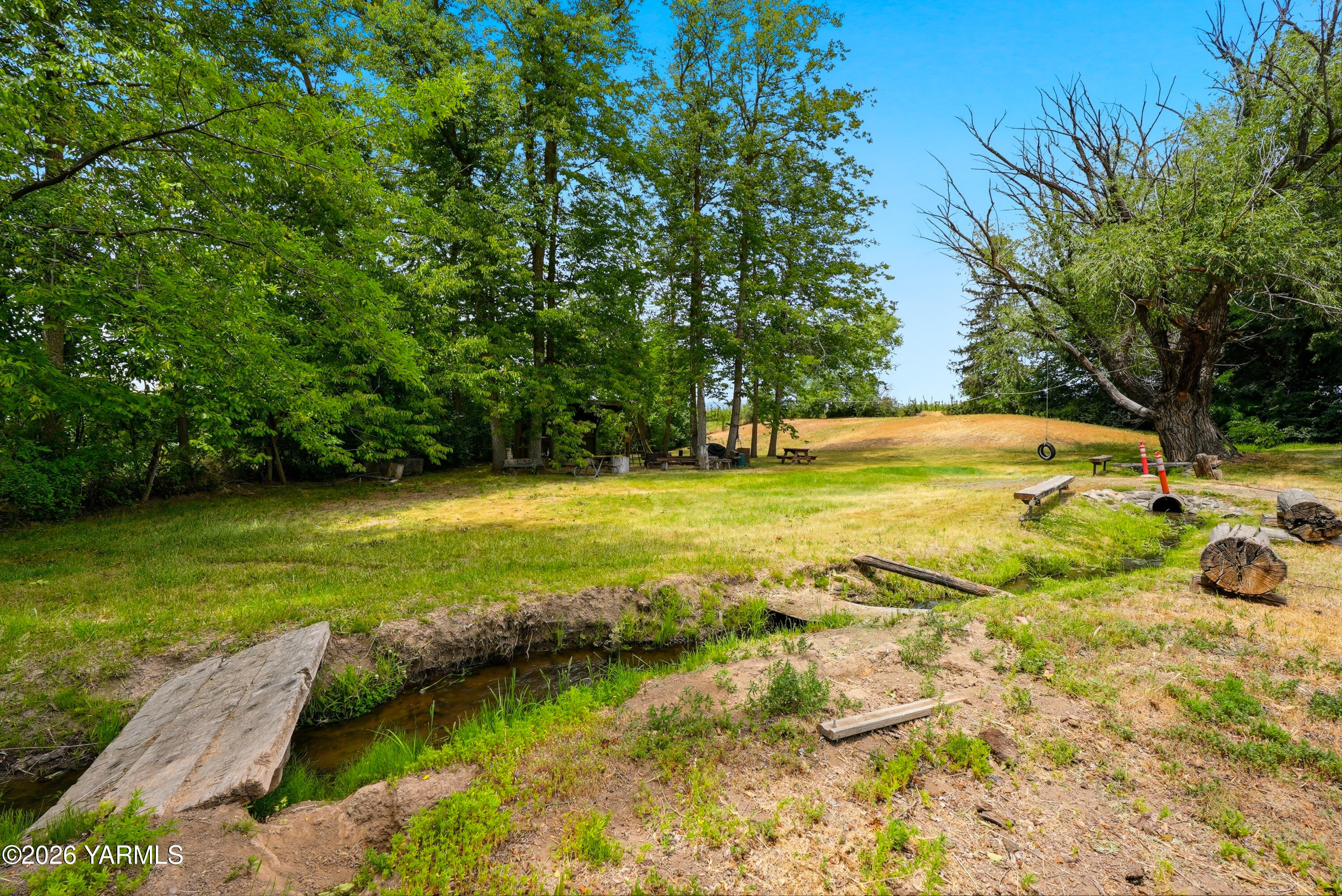 690 North Gleed Road Naches, WA 98937 - Photo 39 of 60 a view of swimming pool with an outdoor space and seating area