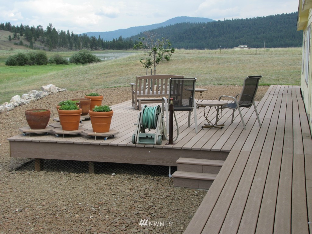 29 Duck Flat Road Tonasket, WA 98855 - Photo 4 of 18 a view of a lake with mountain view