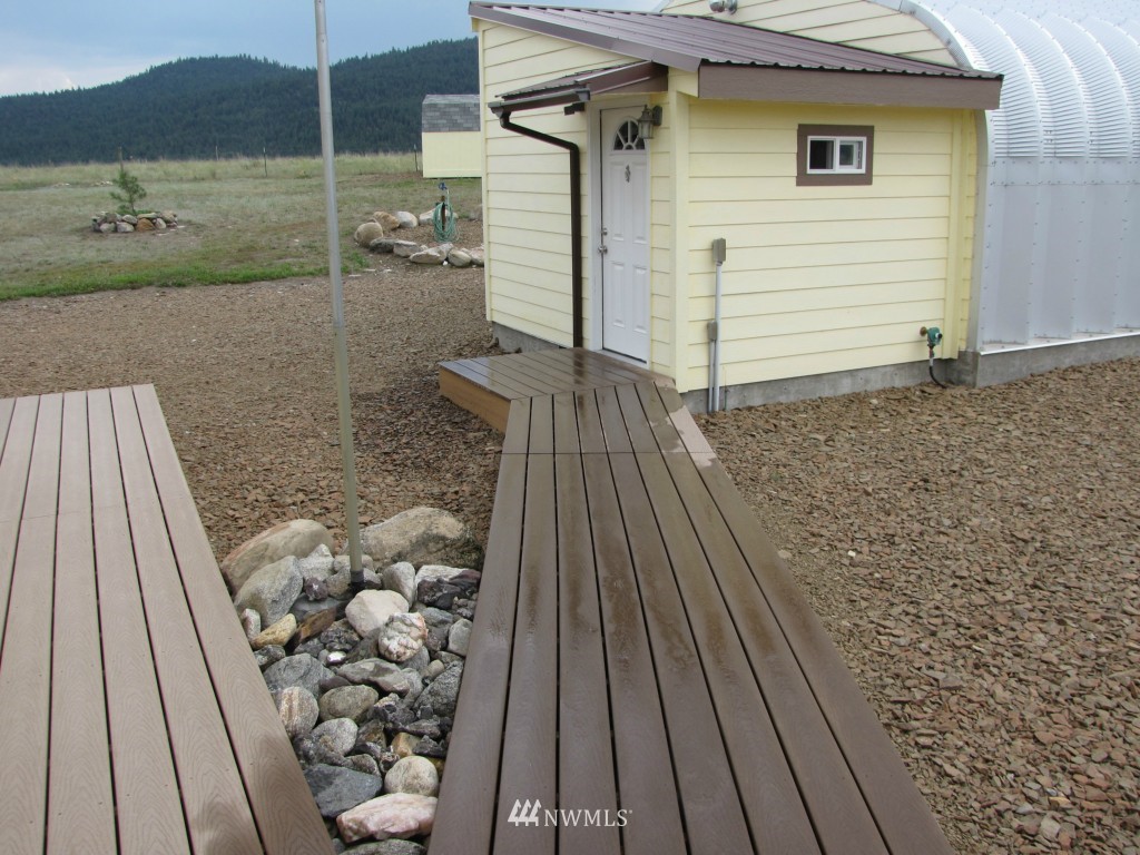 29 Duck Flat Road Tonasket, WA 98855 - Photo 7 of 18 a view of a wooden door