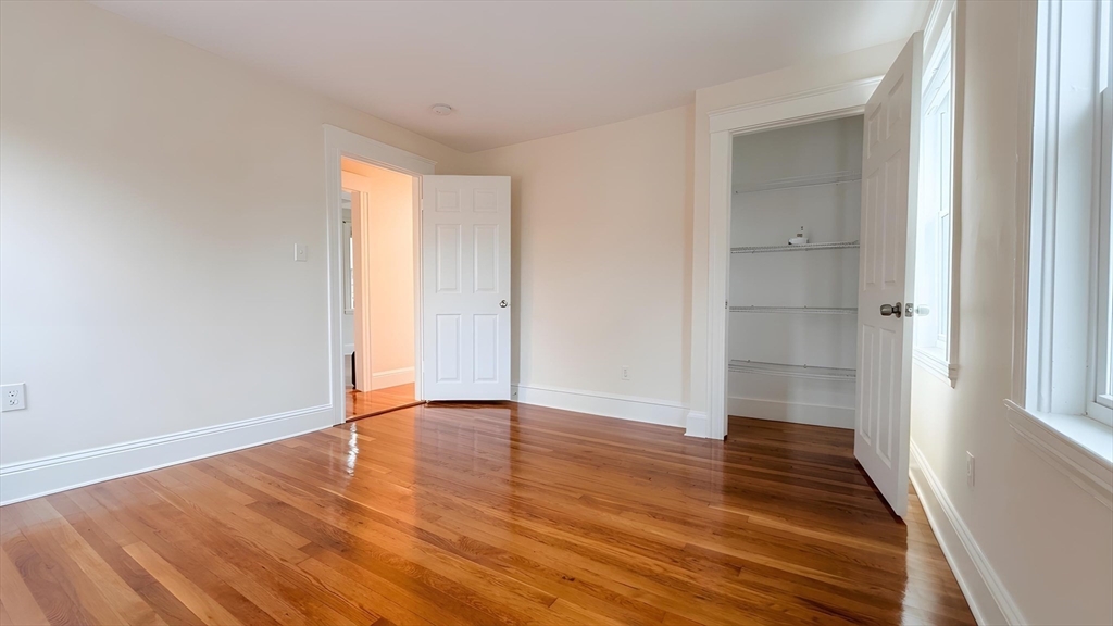 114 Curve Street Dedham, MA 02026 - Photo 19 of 27 wooden floor in an empty room