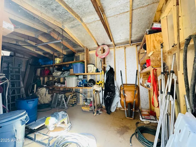 a view of a yard with chairs