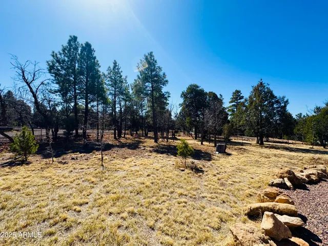 a view of swimming pool with outdoor seating