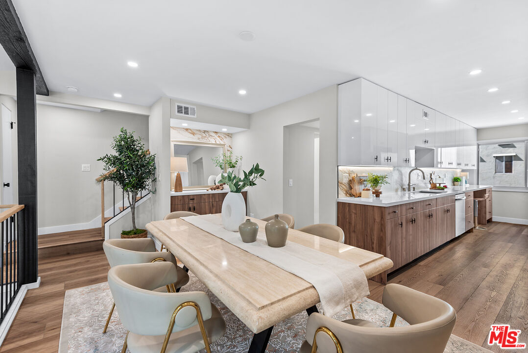 13135 Mindanao Way, Unit 5 Marina del Rey, CA 90292 - Photo 2 of 45 a dining room with furniture and wooden floor