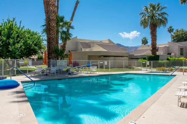 a view of swimming pool with a patio