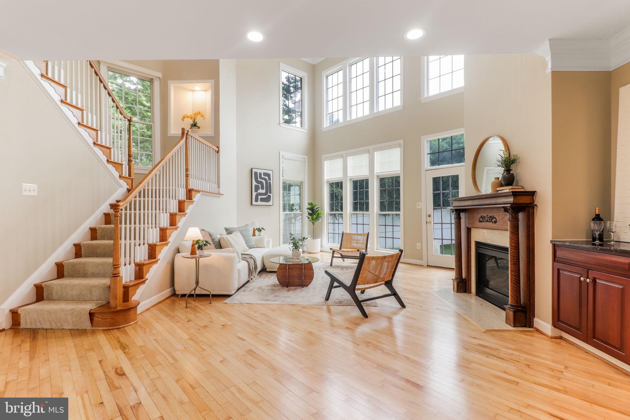 710 Crisfield Way Annapolis, MD 21401 - Photo 12 of 80 a living room with furniture fireplace and wooden floor
