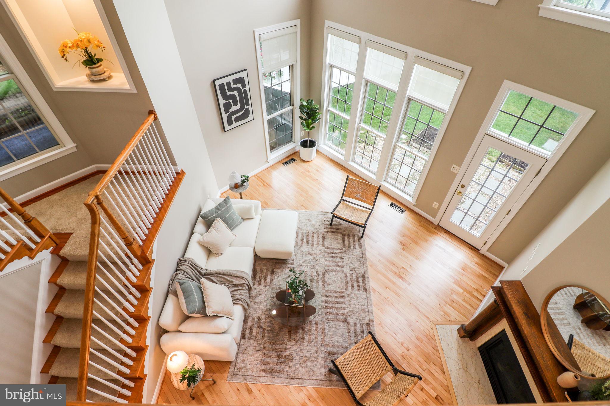 710 Crisfield Way Annapolis, MD 21401 - Photo 17 of 80 a view of living room with furniture and floor to ceiling windows