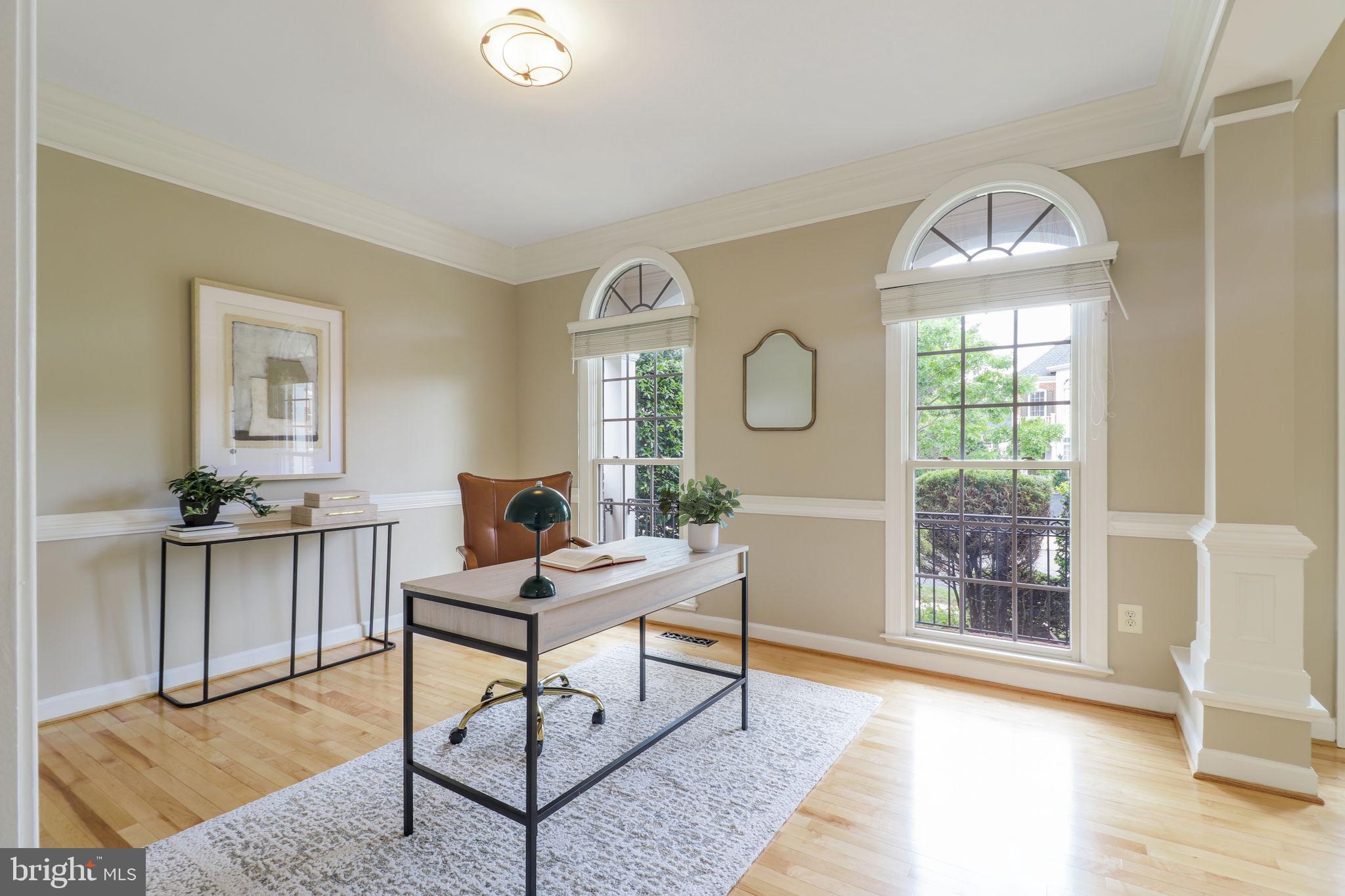 710 Crisfield Way Annapolis, MD 21401 - Photo 22 of 80 a living room with furniture and a window