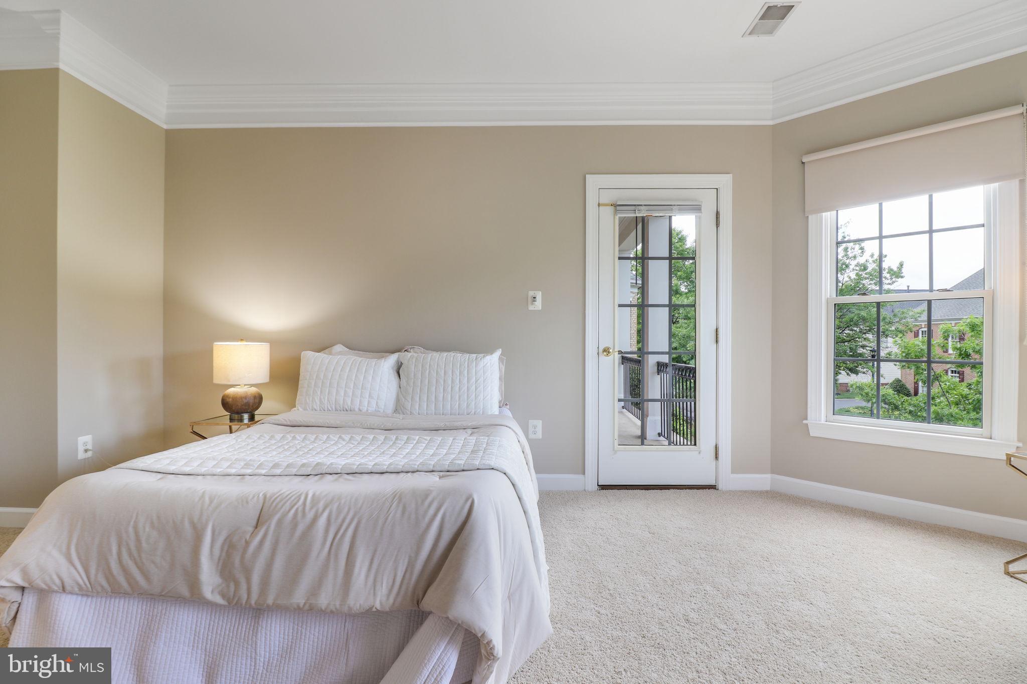 710 Crisfield Way Annapolis, MD 21401 - Photo 38 of 80 a bed room with a bed and a large window