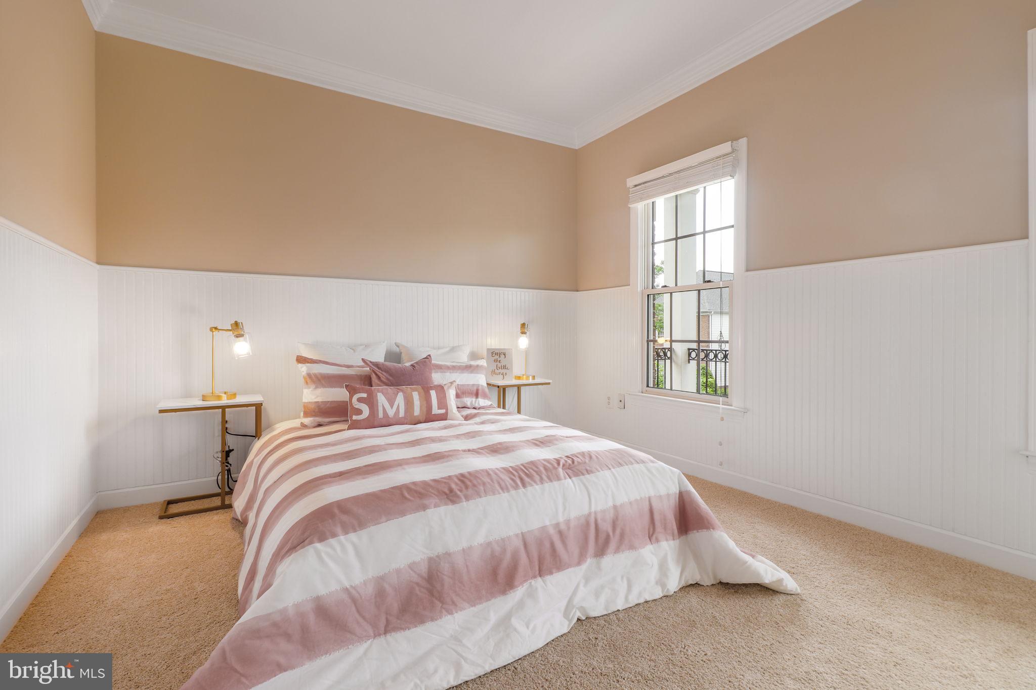 710 Crisfield Way Annapolis, MD 21401 - Photo 40 of 80 a bedroom with a bed and a window