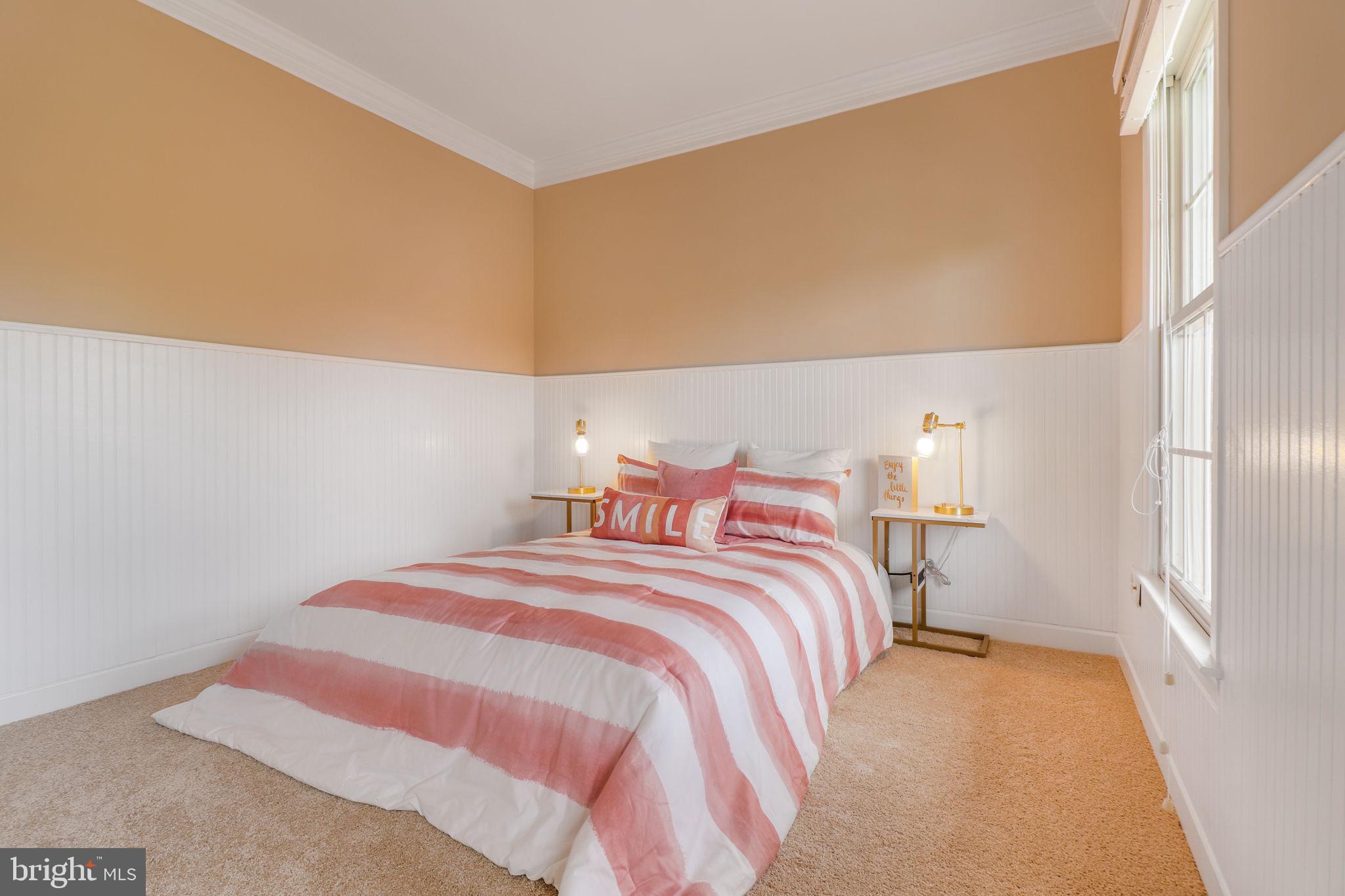 710 Crisfield Way Annapolis, MD 21401 - Photo 41 of 80 a bedroom with a bed and a cabinets