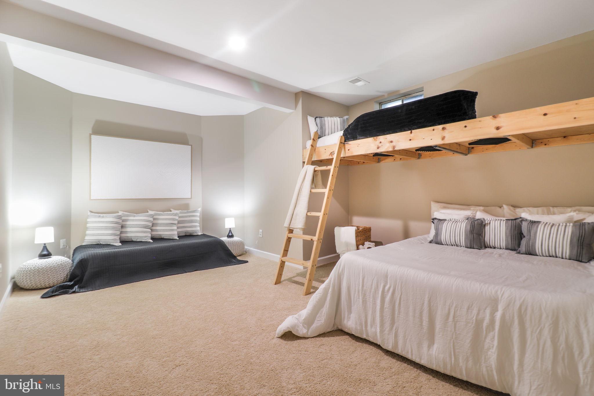 710 Crisfield Way Annapolis, MD 21401 - Photo 46 of 80 a bedroom with a bed and window