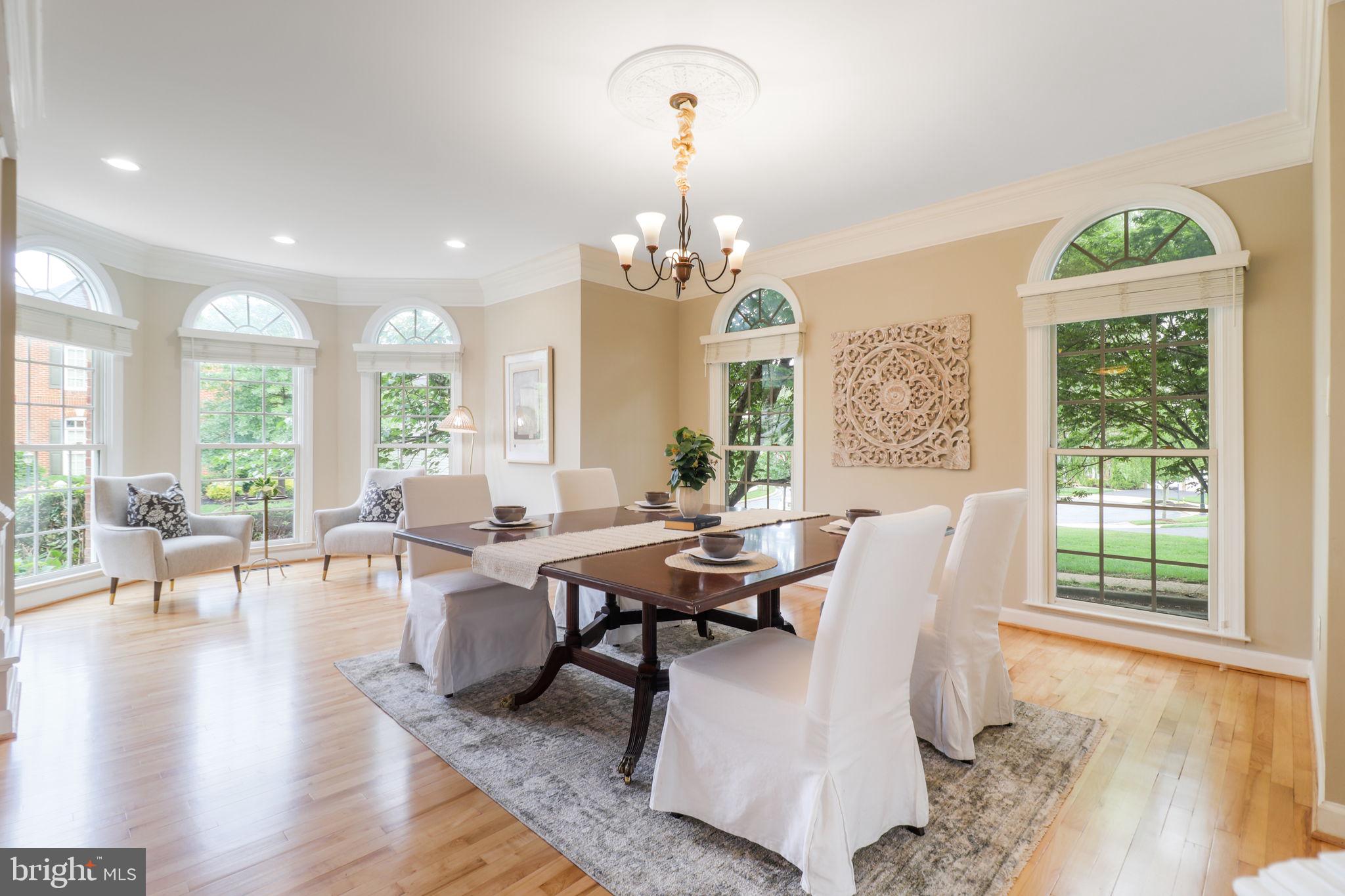 710 Crisfield Way Annapolis, MD 21401 - Photo 5 of 80 a view of a dining room with furniture window and wooden floor