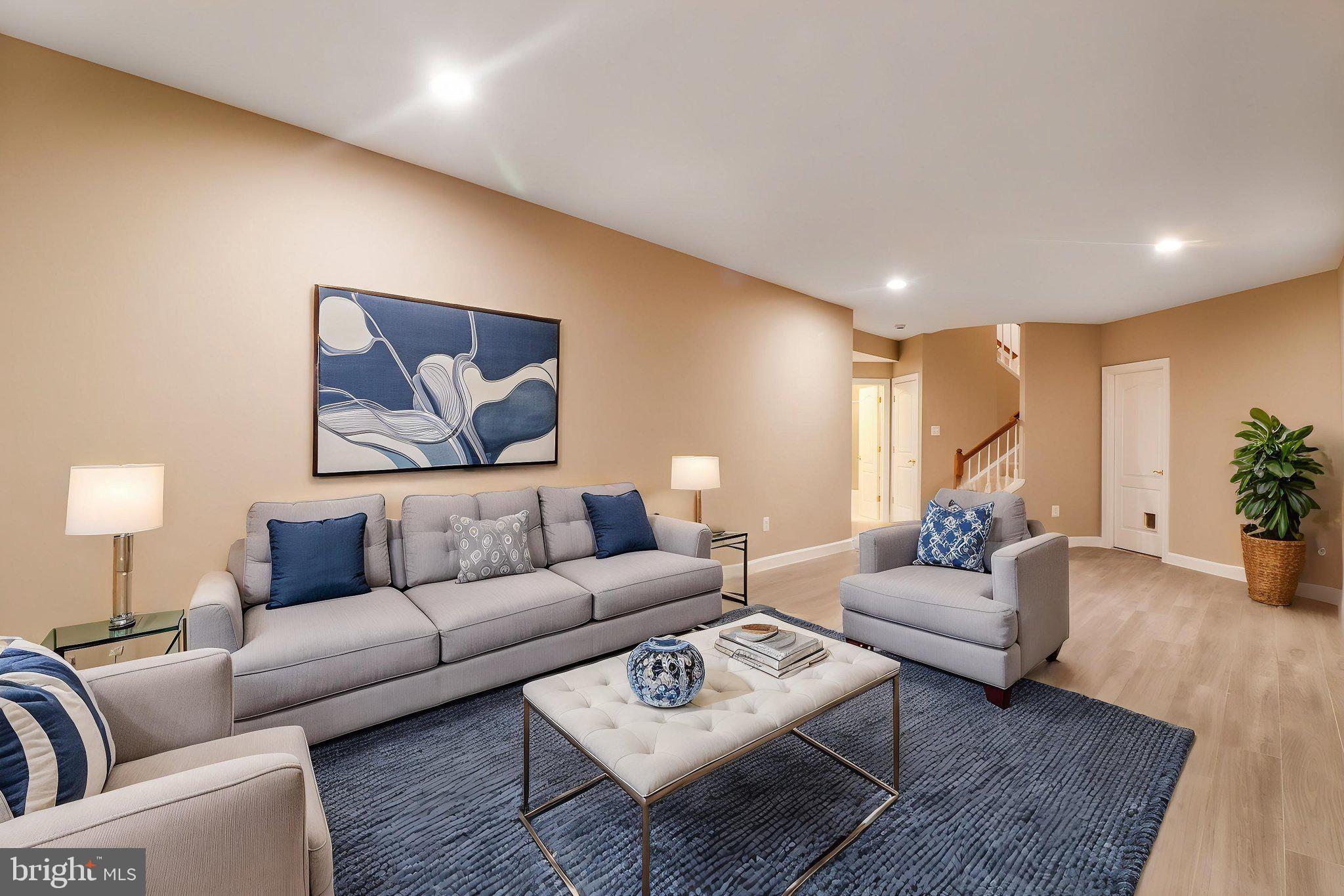 710 Crisfield Way Annapolis, MD 21401 - Photo 51 of 80 a living room with furniture and a couch