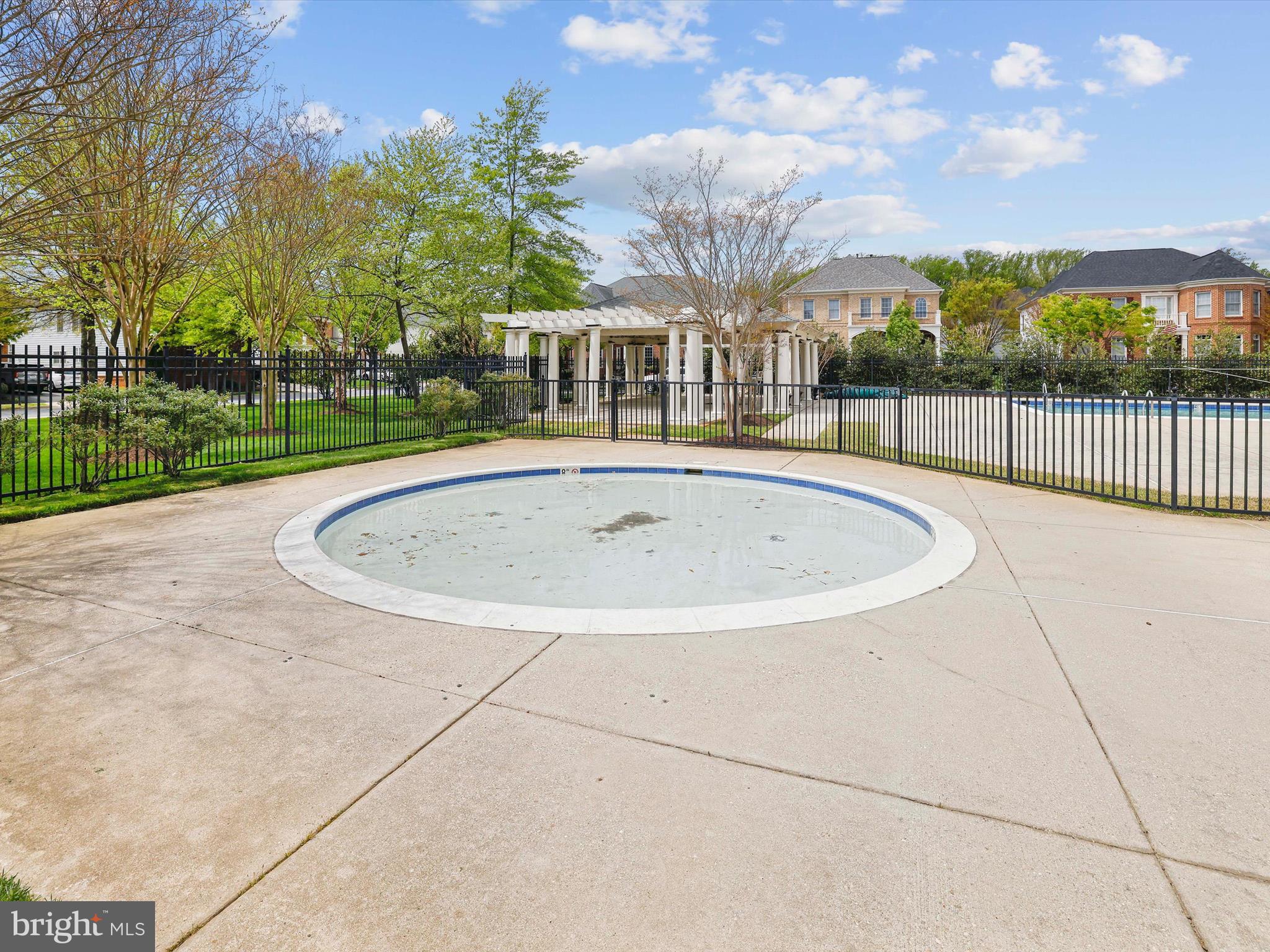 710 Crisfield Way Annapolis, MD 21401 - Photo 64 of 80 a view of fountain with a swimming pool and a yard