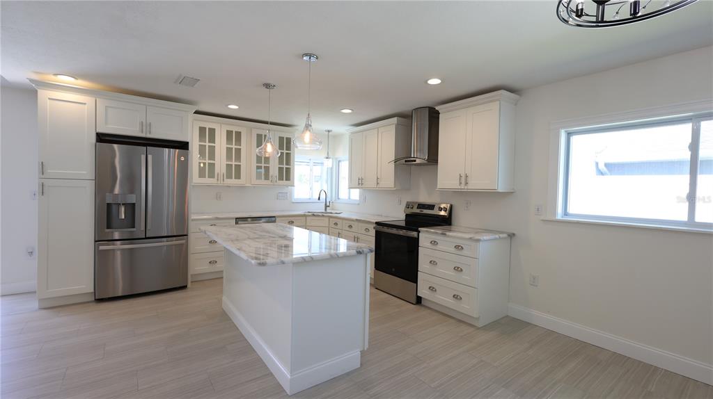 9737 San Vincente Way Port Richey, FL 34668 - Photo 7 of 26