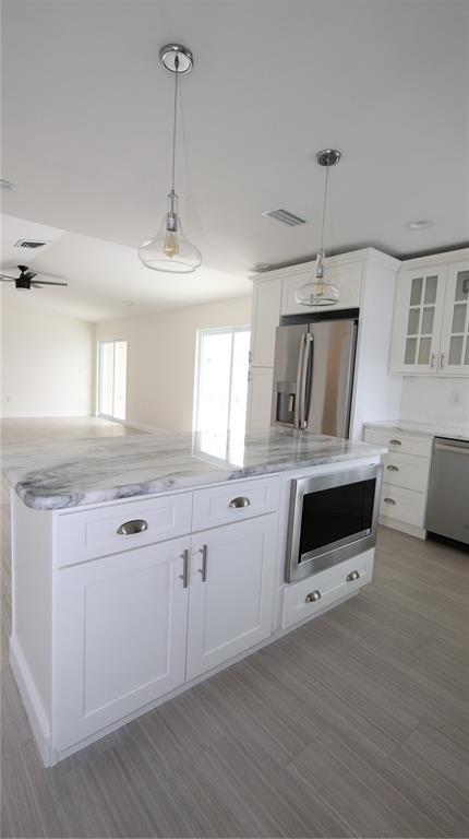 9737 San Vincente Way Port Richey, FL 34668 - Photo 9 of 26