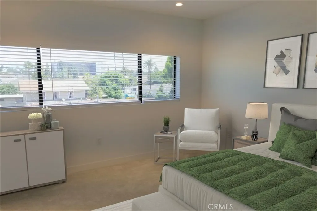 231 North Burlington Avenue Echo Park, CA 90026 - Photo 4 of 10 a living room with furniture and a large window