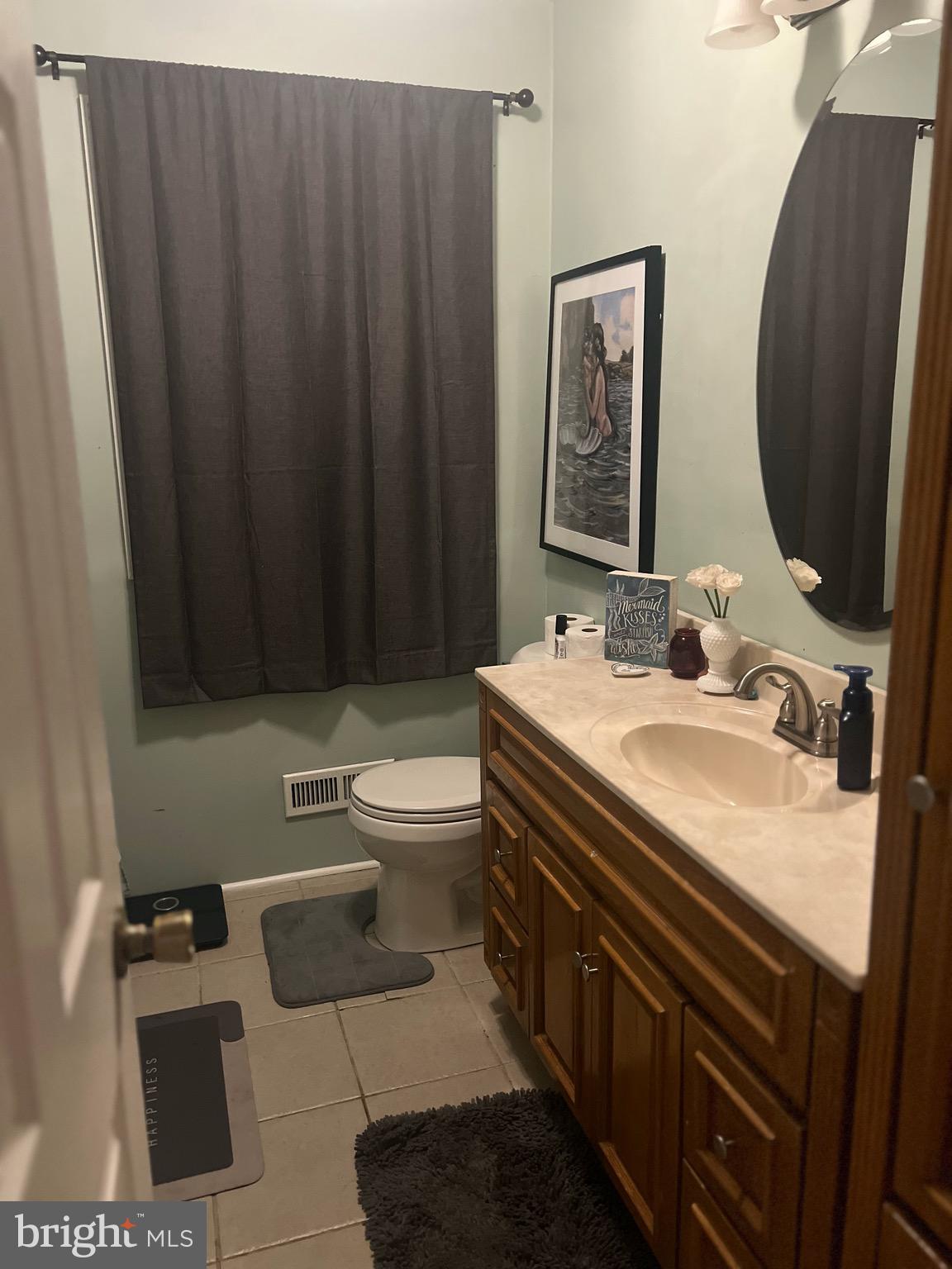 321 Timberline Drive Mount Laurel, NJ 08054 - Photo 4 of 14 a bathroom with a sink a toilet and mirror