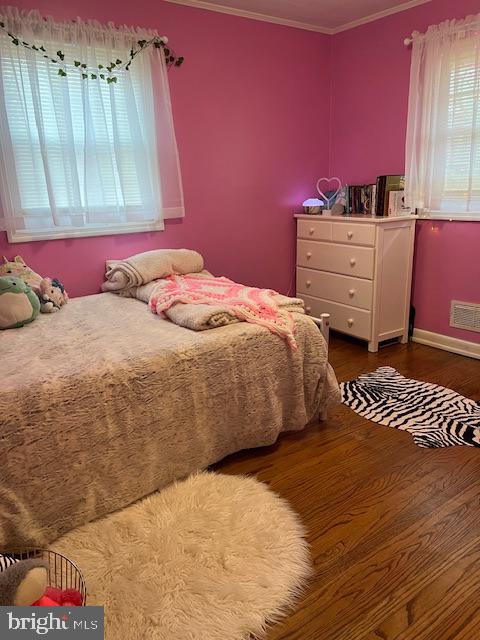 321 Timberline Drive Mount Laurel, NJ 08054 - Photo 9 of 14 a bedroom with a bed and a dresser