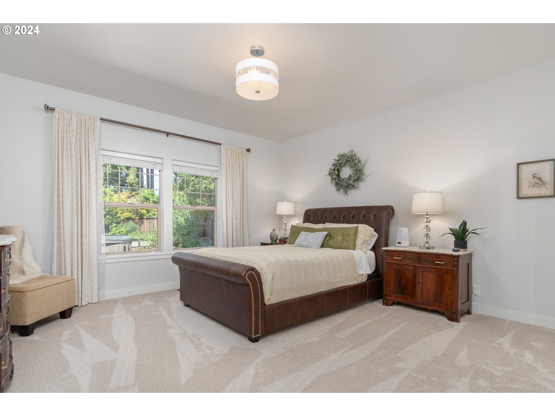 3622 Stark Street Eugene, OR 97404 - Photo 16 of 48 a bedroom with a bed and a large window