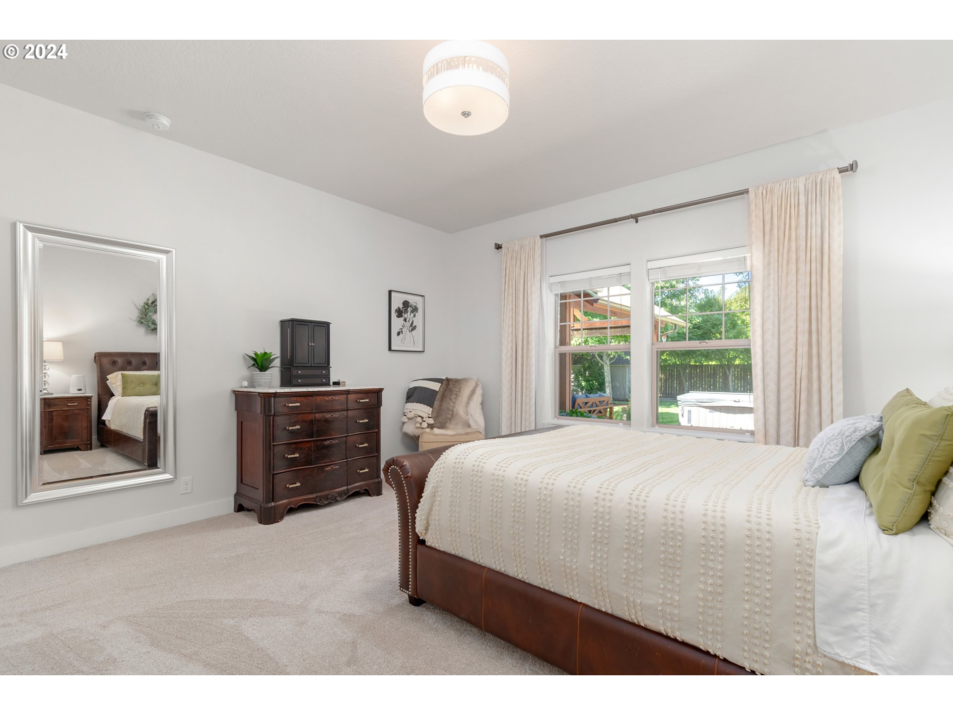 3622 Stark Street Eugene, OR 97404 - Photo 17 of 48 a bedroom with a bed and a large window
