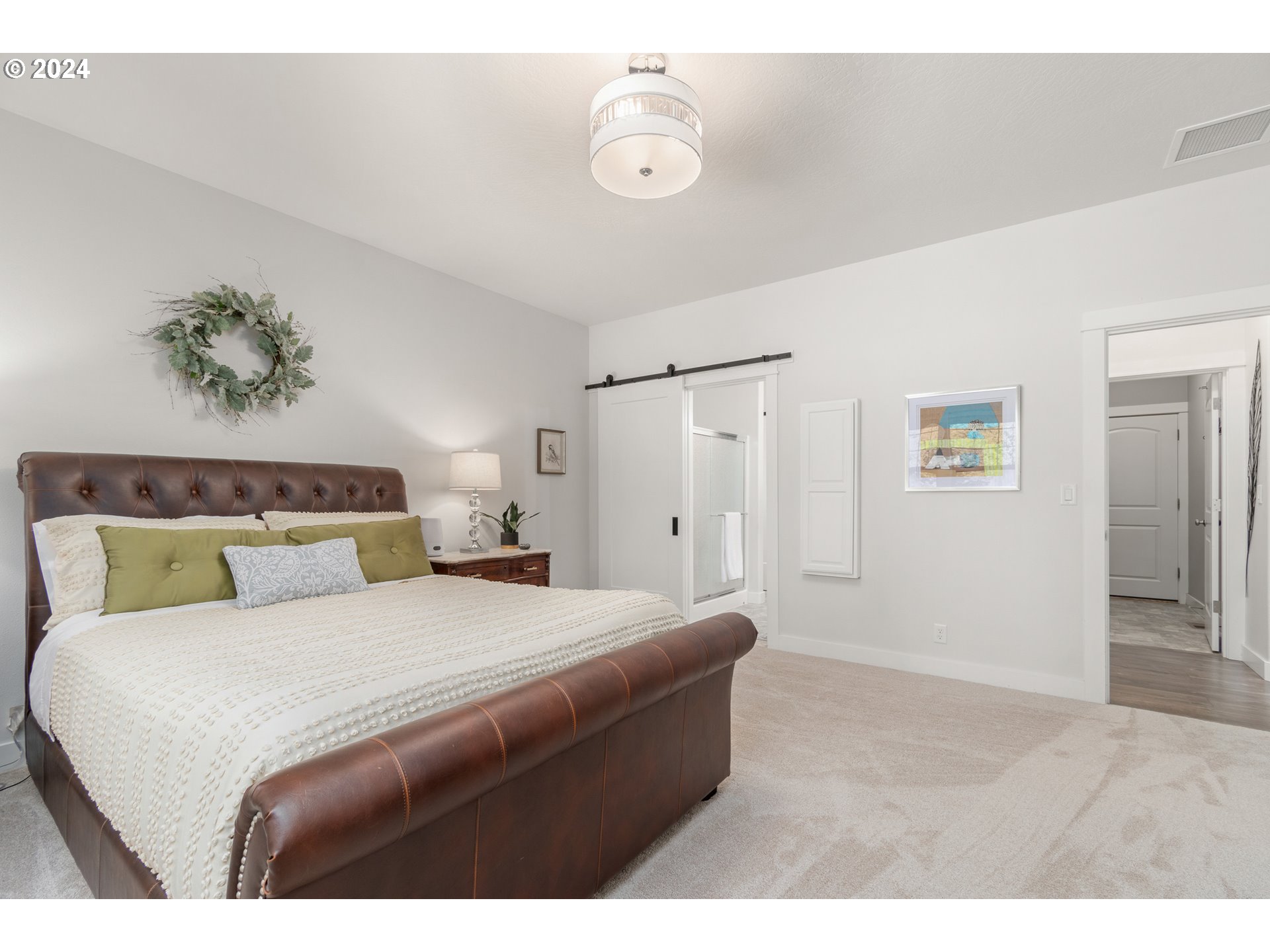 3622 Stark Street Eugene, OR 97404 - Photo 18 of 48 a bedroom with a bed and painting on the wall