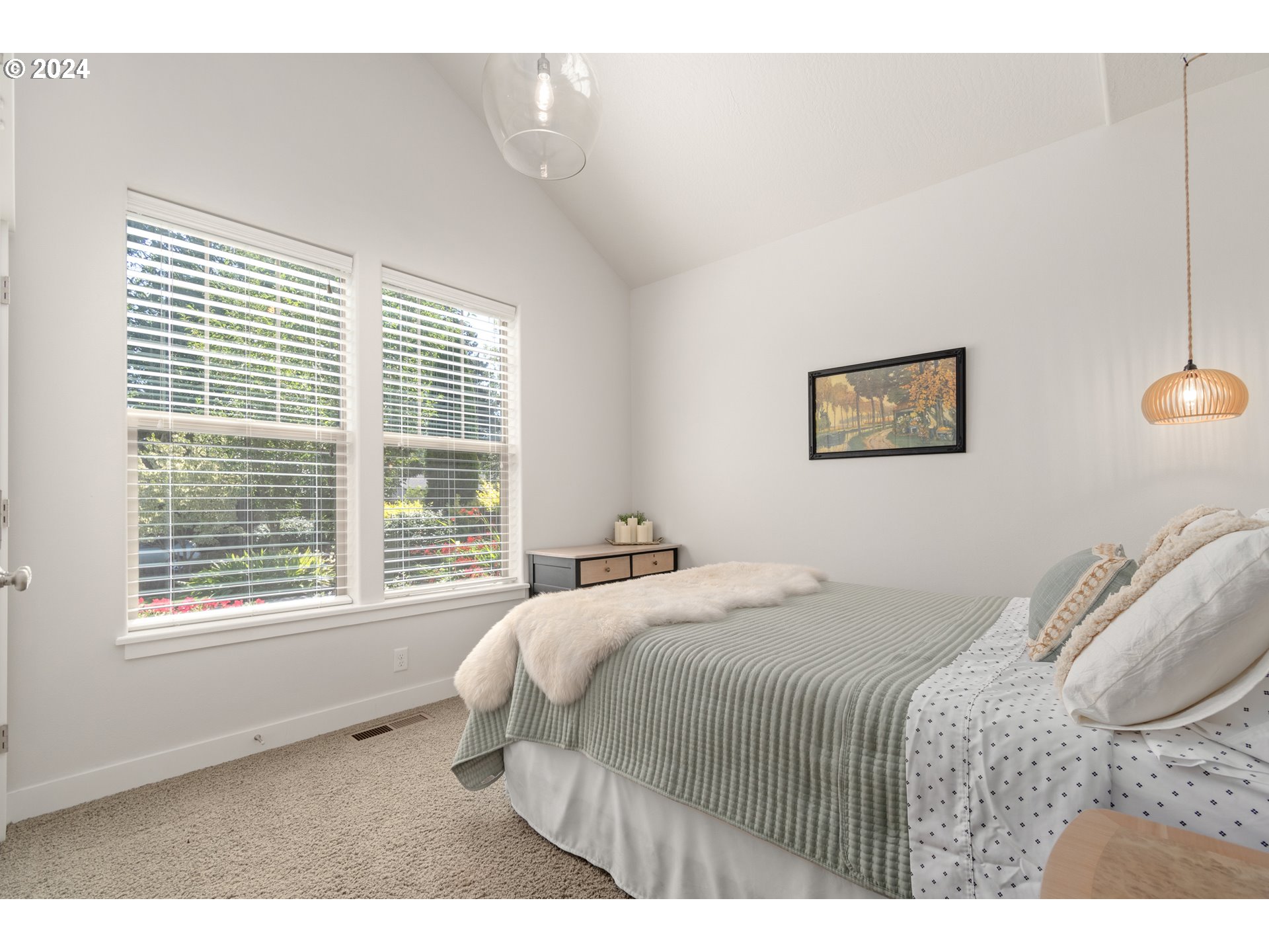 3622 Stark Street Eugene, OR 97404 - Photo 23 of 48 a bedroom with a bed and a window