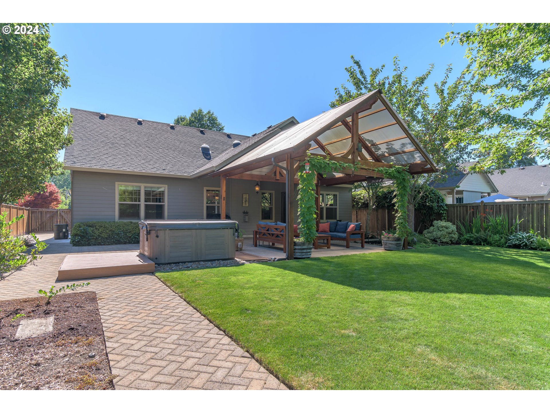3622 Stark Street Eugene, OR 97404 - Photo 37 of 48 a view of a house with backyard porch and sitting area
