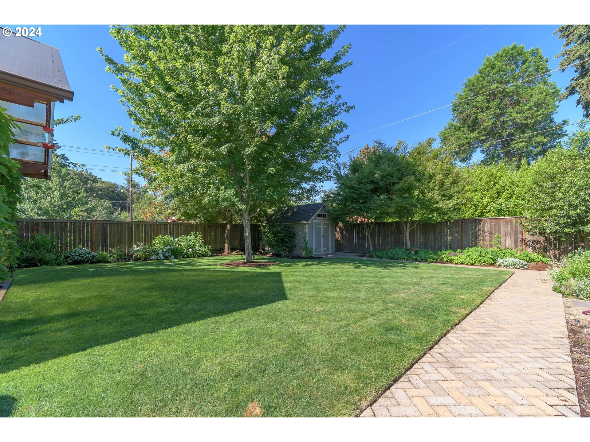 3622 Stark Street Eugene, OR 97404 - Photo 40 of 48 a view of a backyard with a garden