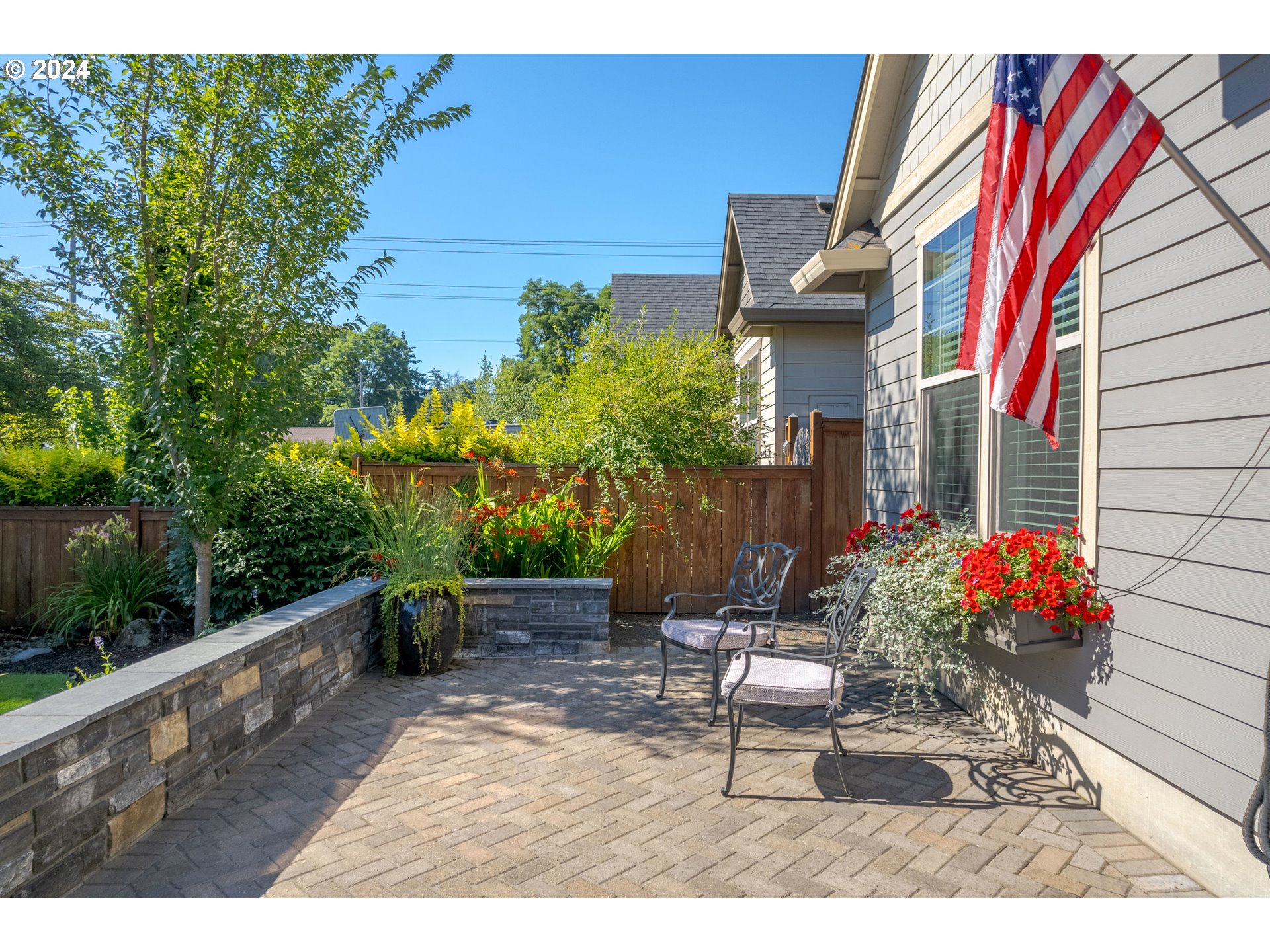3622 Stark Street Eugene, OR 97404 - Photo 4 of 48 a view of a chairs and table in the backyard