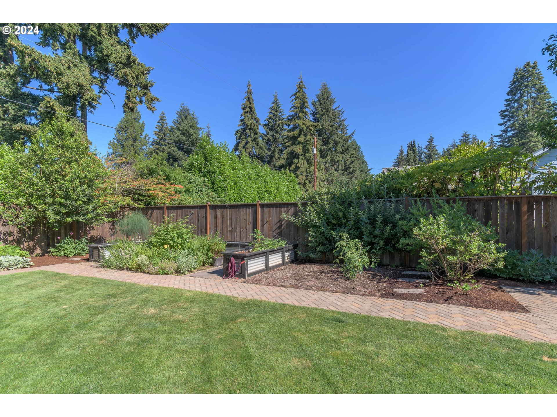3622 Stark Street Eugene, OR 97404 - Photo 41 of 48 a view of a backyard with a table and chairs