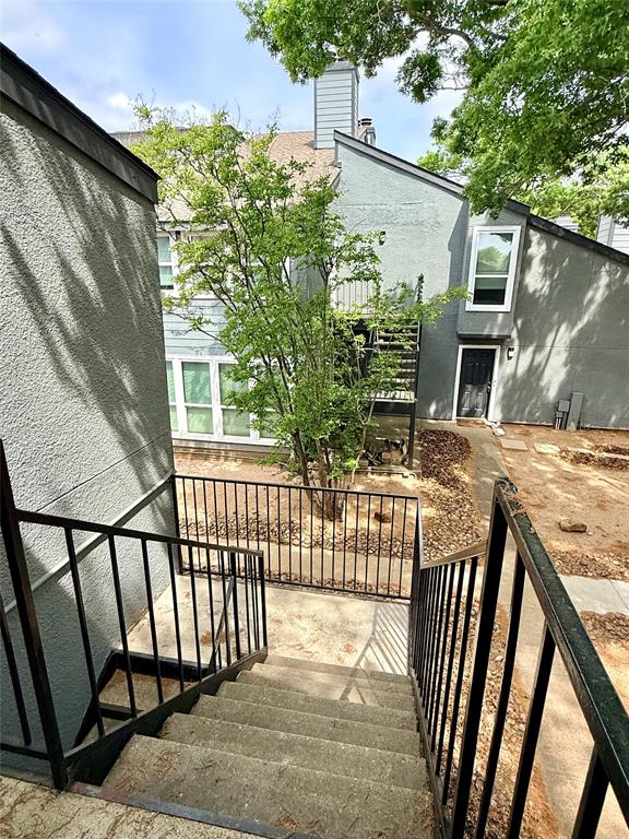 9696 Walnut Street, Unit 813 Dallas, TX 75243 - Photo 18 of 21 a view of a house with backyard and sitting area