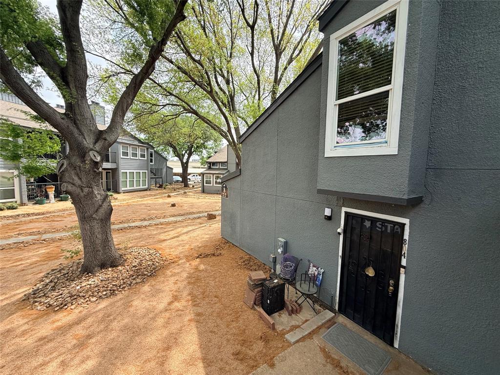 9696 Walnut Street, Unit 813 Dallas, TX 75243 - Photo 21 of 21 a backyard of a house with table and chairs