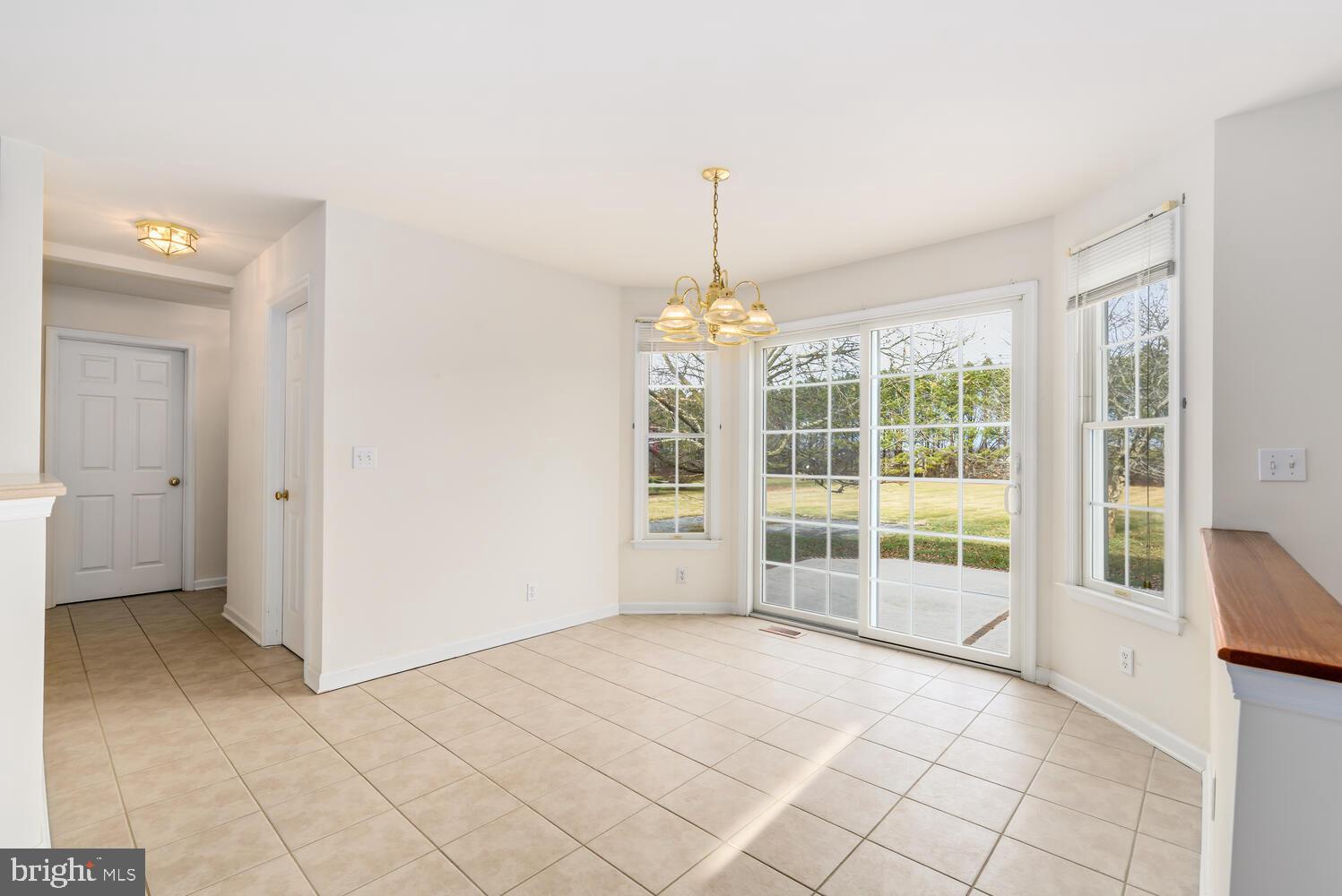 30224 Chestnut Ridge Lane Trappe, MD 21673 - Photo 16 of 46 a view of an empty room with a window