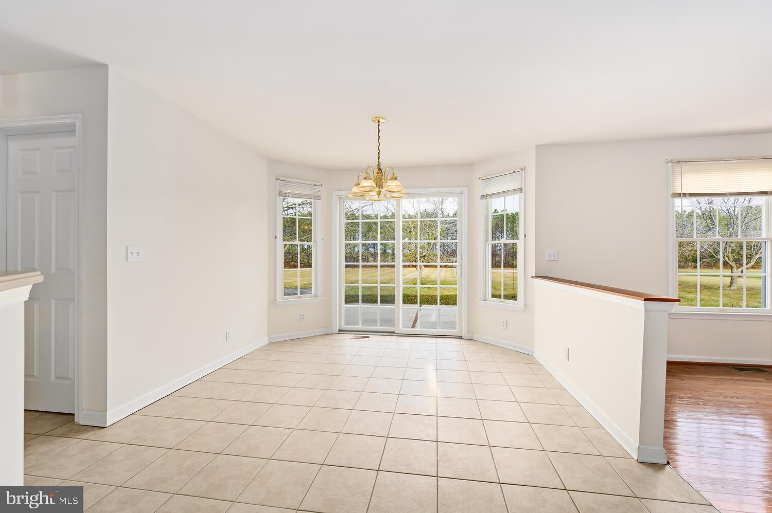 30224 Chestnut Ridge Lane Trappe, MD 21673 - Photo 17 of 46 a view of an empty room with a window