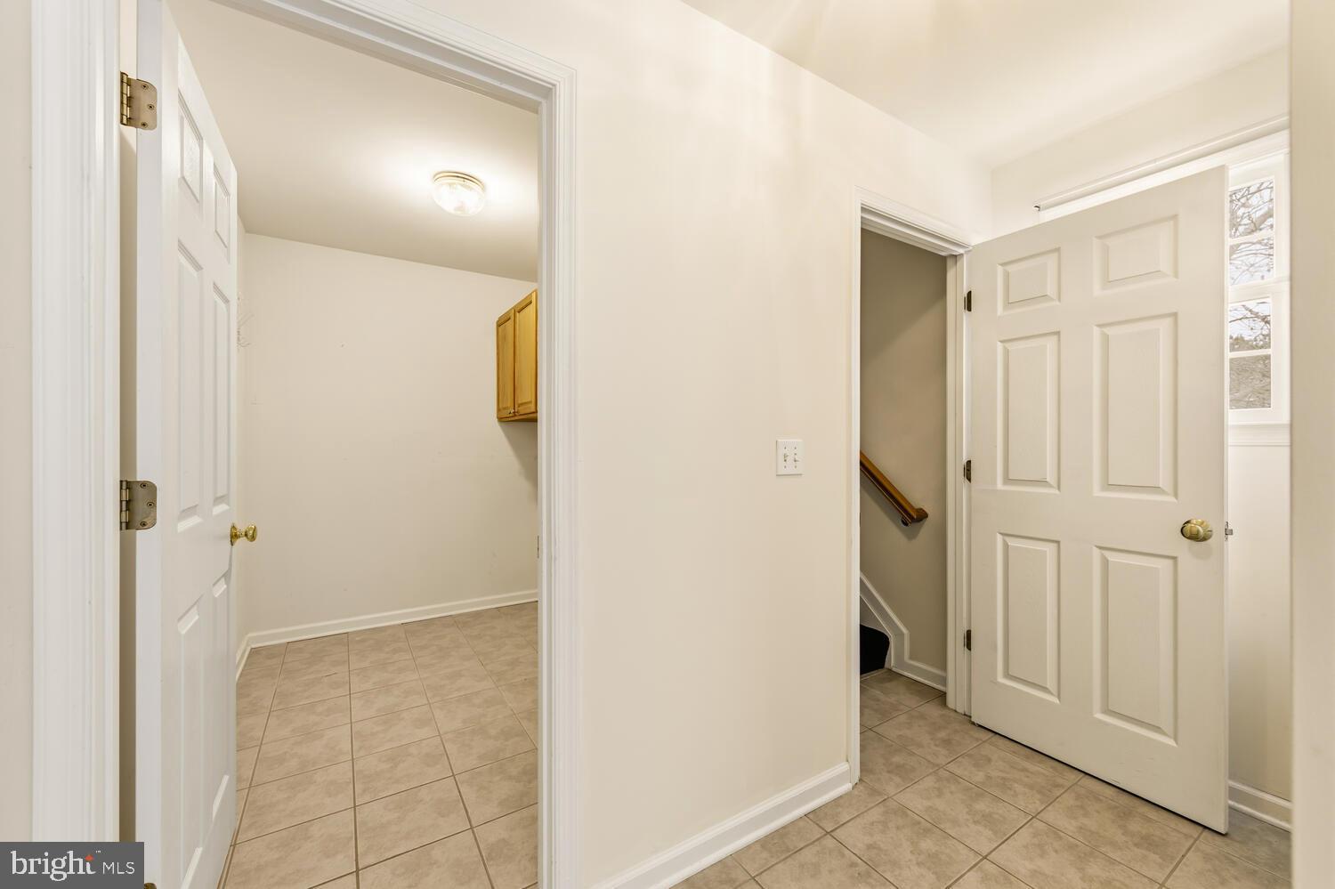 30224 Chestnut Ridge Lane Trappe, MD 21673 - Photo 22 of 46 a view of a hallway with wooden floor